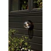 Nuura utendørs vegglampe Liila, Ø 16 cm, svart/klar