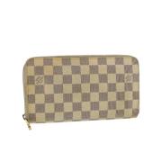 Pre-owned Beige lerret Louis Vuitton lommebok