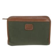 Pre-owned Canvas clutches