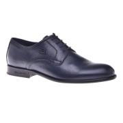 Lace-up in dark blue tumbled leather