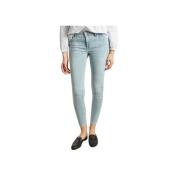 Faded Skinny Jeans med Metallknapp