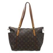 Pre-owned Fabric handbags